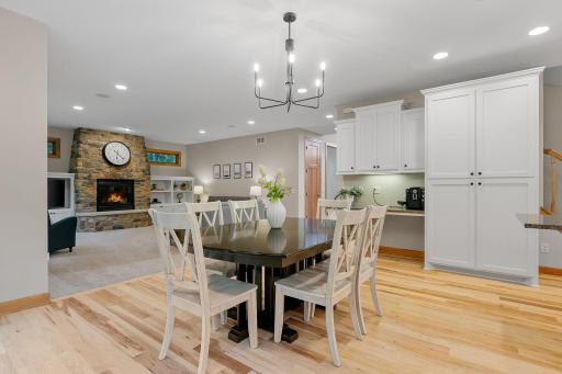 Full height pantry, workstation w/ file drawers, and under cabinet accent lighting