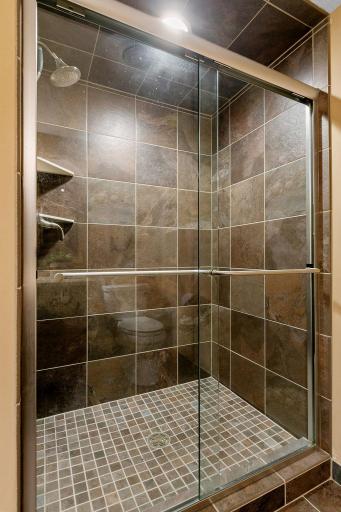 Custom tile shower w/ semi-frameless doors