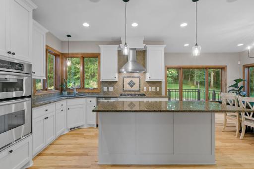 Balanced combination of modern pendants and recessed lighting