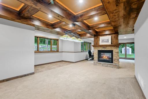 Rustic alder coffered ceilings w/ accent lighting