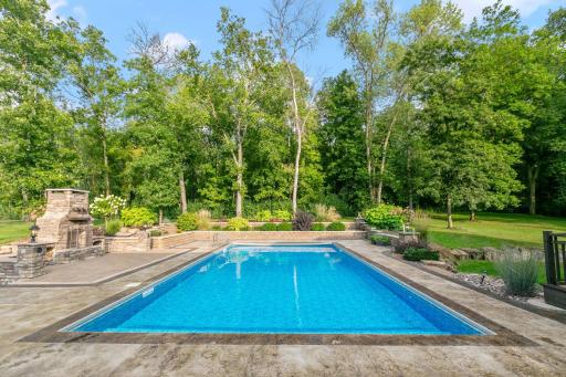 In-ground saltwater heated pool 40 x 20 includes a retractable cover