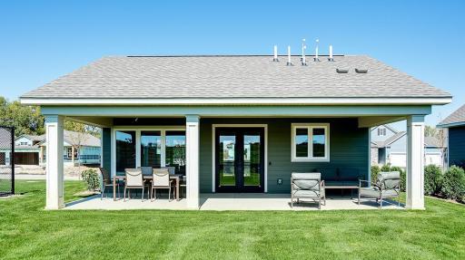 Community clubhouse back patio area. Sit and enjoy the sunshine and some yard games with neighbors!