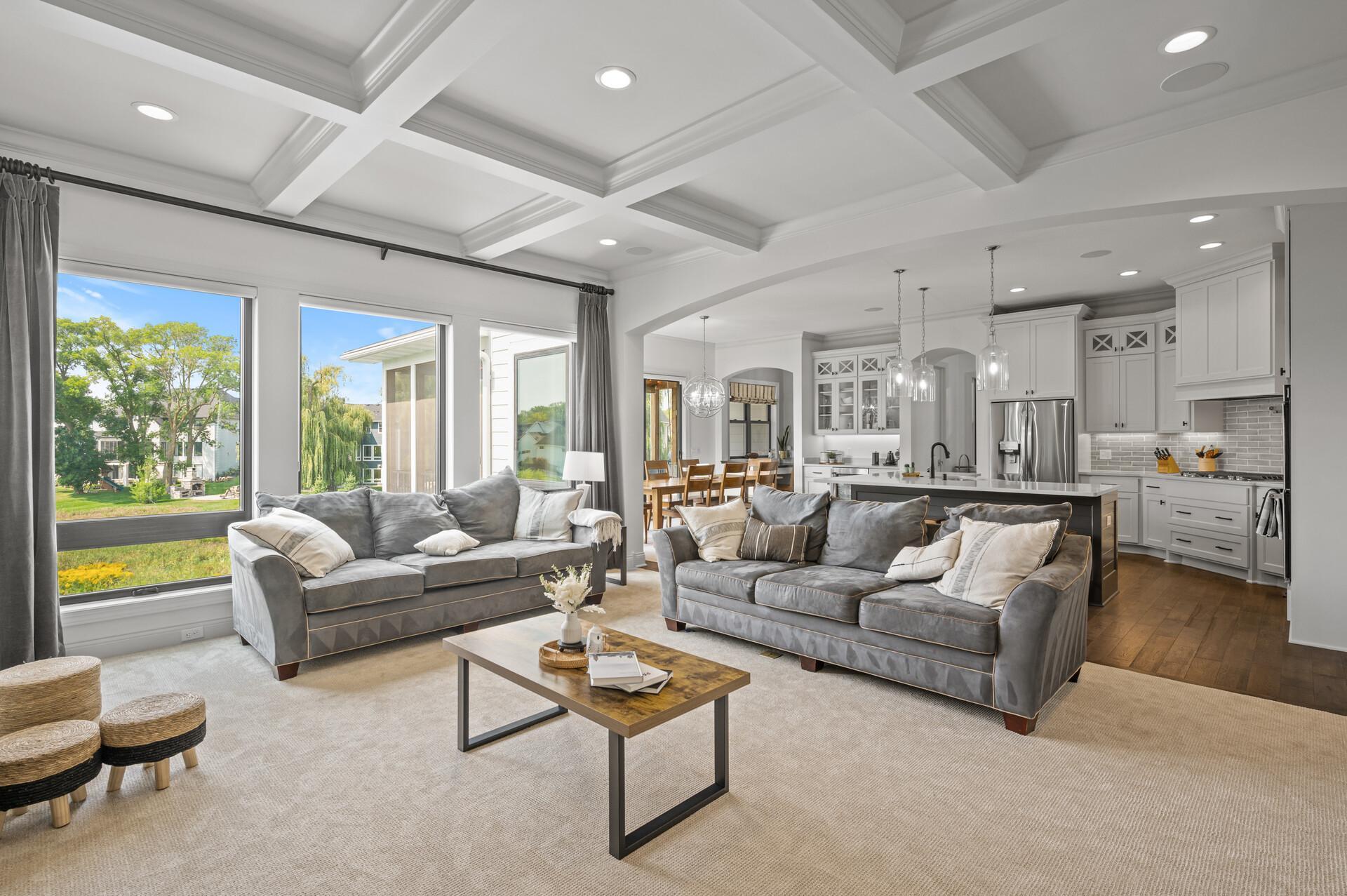 Welcoming open floor plan that seamlessly connects different living areas, creating a sense of flow and spaciousness and a built-in surround sound system integrated throughout much of the home, enhancing the entertainment experience.