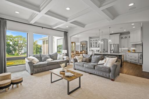 Welcoming open floor plan that seamlessly connects different living areas, creating a sense of flow and spaciousness and a built-in surround sound system integrated throughout much of the home, enhancing the entertainment experience.