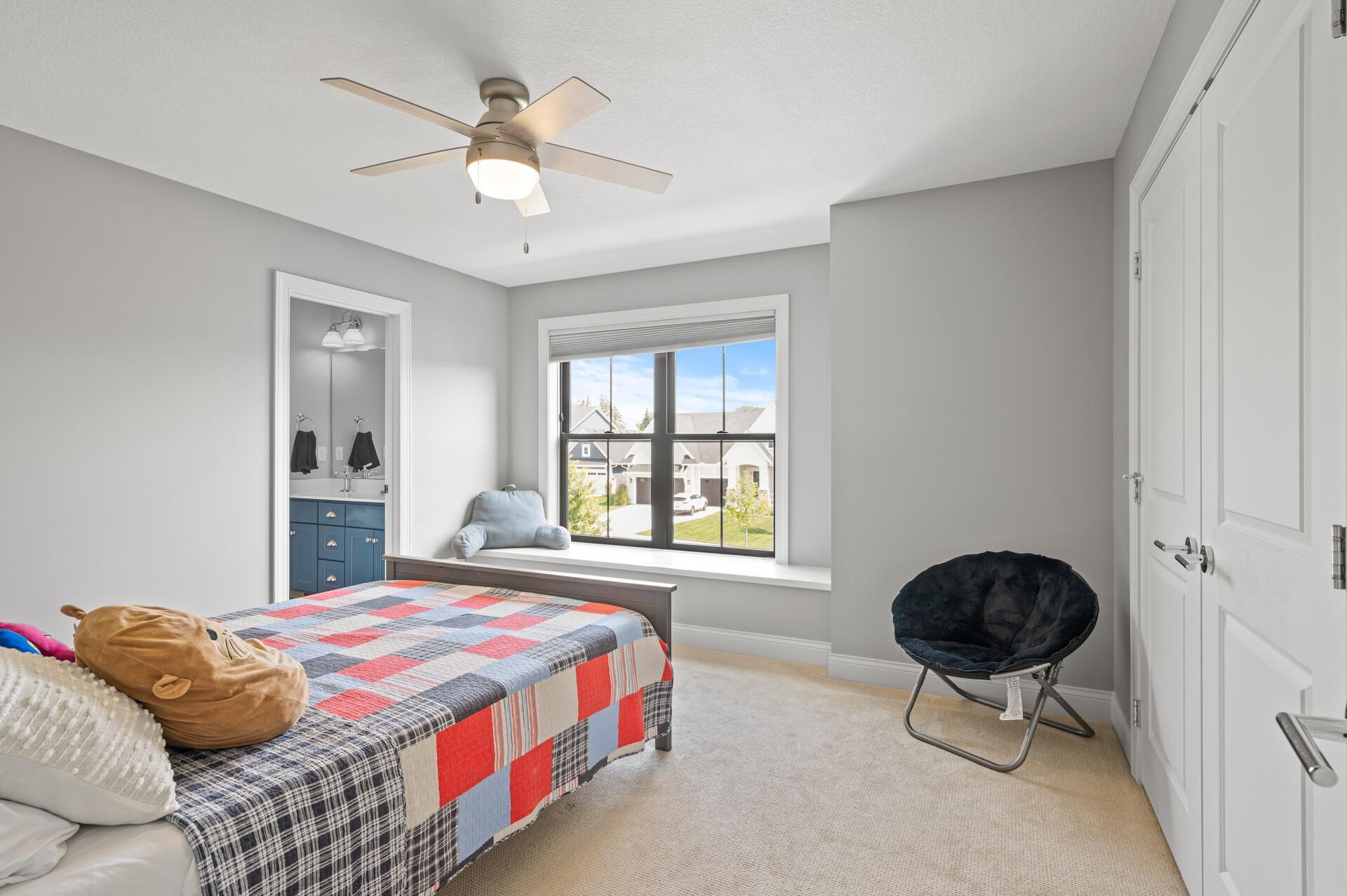 Two junior bedrooms connected by a Jack and Jill bathroom, providing comfortable and private accommodations.