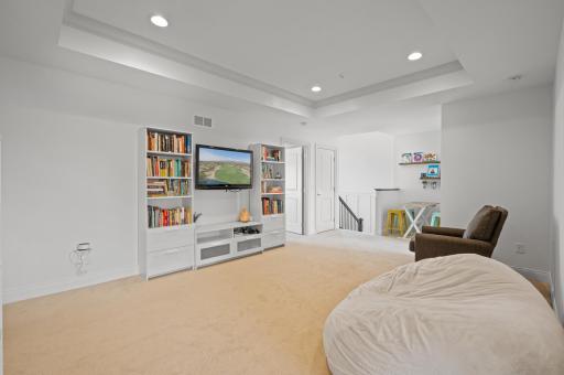 Versatile loft area that can serve as a cozy reading nook, study space, or additional family gathering spot.