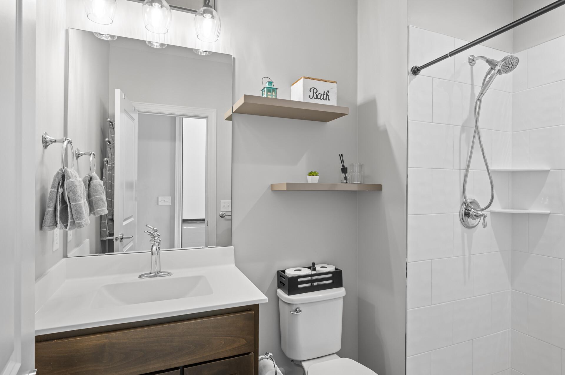 Lower level three-quarter bathroom.