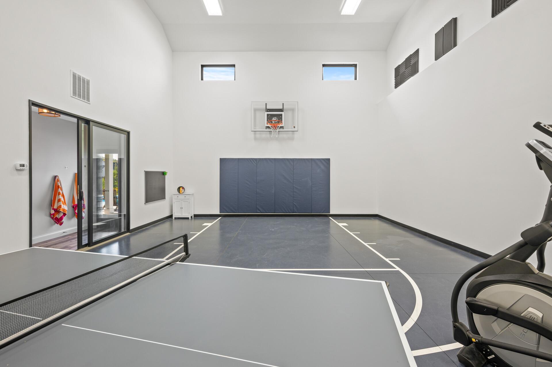 Sport court that offers a space for indoor physical activities and play, catering to a healthy and active lifestyle.