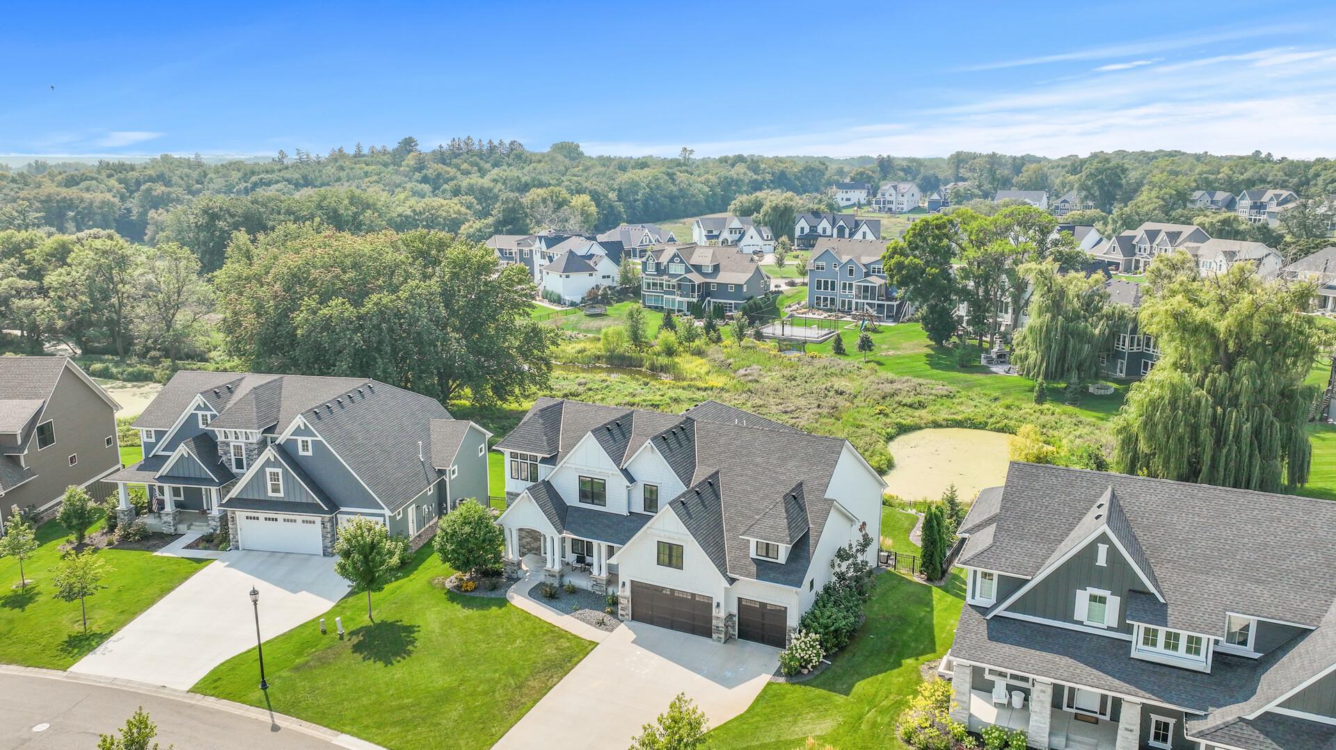 Attached 3+ car garage with ample space for vehicles and storage, catering to practical needs.