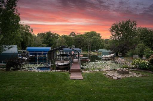 Enjoy the pleasure of fishing right from your own dock and engage in various water-based recreational activities while surrounded by the breathtaking beauty of a park-like setting in your very own backyard.