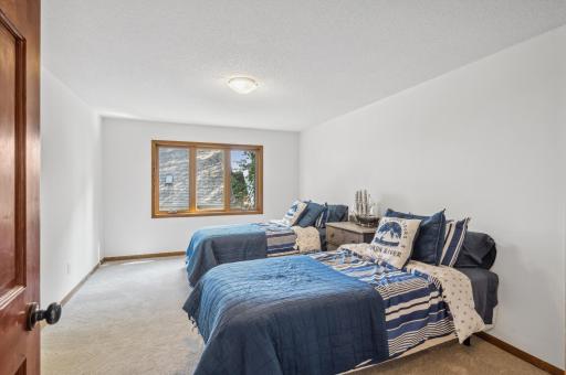 View of bedroom #2 on the upper level. New carpet throughout the upper level!