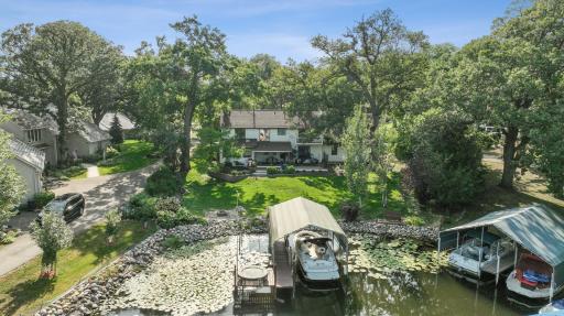 This exceptional property harmoniously blends the tranquility of lakeside living with modern comforts, making it an ideal retreat for those seeking the perfect waterfront sanctuary.