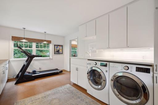 Main floor laundry room - Very large with desk space.