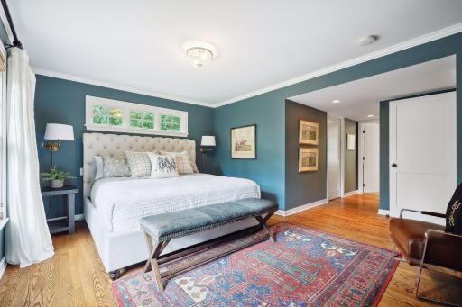 Primary suite walks through to large closet and bath.