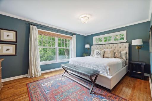 Primary Bedroom - great light with two walls of windows.