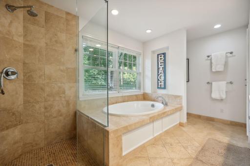 Full primary bathroom with seperate tub and shower.