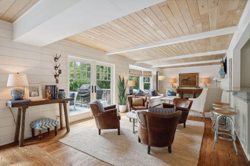 Large Living room with walk-out to sprawling deck.