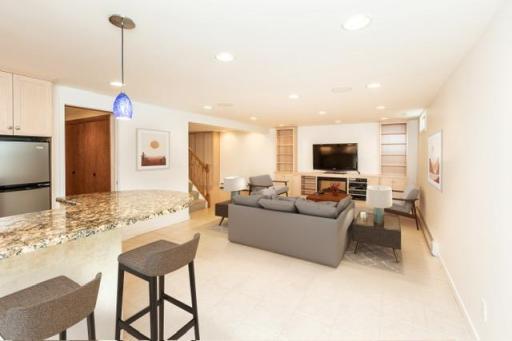 Virtually staged downstairs- family room-H-final.jpg