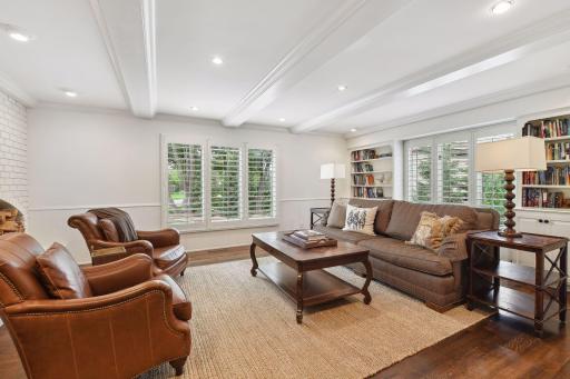 Family room w plenty of light with the windows