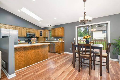 Cozy up to the peninsula or enjoy a meal in the dining area. Either way, the open flow allows for easy entertaining!