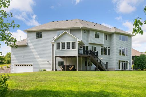 Photo for 16655 32nd Avenue N, Plymouth, MN 55447 - Listing #6430181 Asphalt drive leads to 2nd garage on the lower level. The expansive backyard is ideal for a pool!