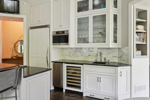 Photo for 16655 32nd Avenue N, Plymouth, MN 55447 - Listing #6430181 Wine cooler, prep-sink, and Scotsman ice maker! Glass front cabinets.