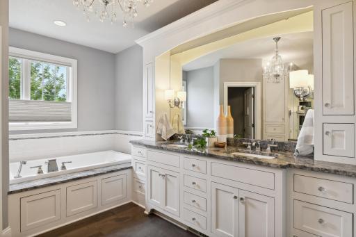 Photo for 16655 32nd Avenue N, Plymouth, MN 55447 - Listing #6430181 Private primary bath is a spa like oasis! Soaking tub with waterfall faucet, granite, and timeless white subway tile surround.