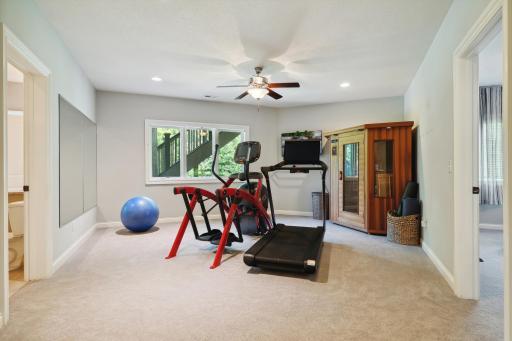Photo for 16655 32nd Avenue N, Plymouth, MN 55447 - Listing #6430181 Double doors lead to one of a few spaces that can be a workout space. The sauna is going with the seller.