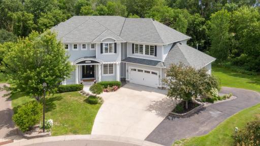 Photo for 16655 32nd Avenue N, Plymouth, MN 55447 - Listing #6430181 Concrete driveway with a new concrete apron and new front steps in 2023. Oversized 3 car garages up and down for a total 6 car capacity with seperate driveway access. Both are heated and both offer separate storage rooms w/shelving.