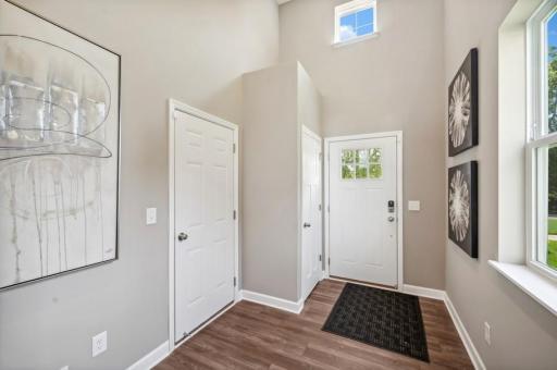 As always, first impressions matter. This welcoming and open foyer will help make a lasting one! (Photo of decorated model, actual home's finishes may vary slightly)