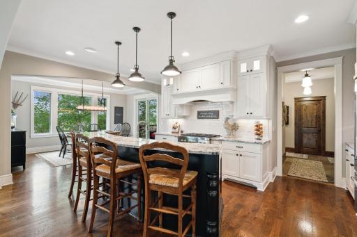Large center island, stainless steel appliances.