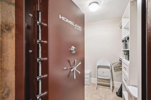 Lower level safe or storm shelter located in lower level bedroom.