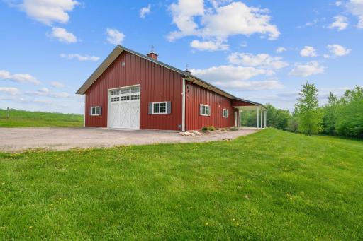 Heated shed that will sell with the property; shed has in floor heat, epoxy floor, 1/2 bathroom (with rough in for shower), the shed has a separate well and septic holding tank. The rear of the shed has a stall for small animals.