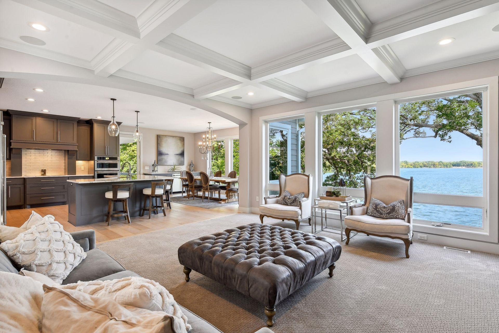 Floor-to-ceiling windows provide commanding lake views.