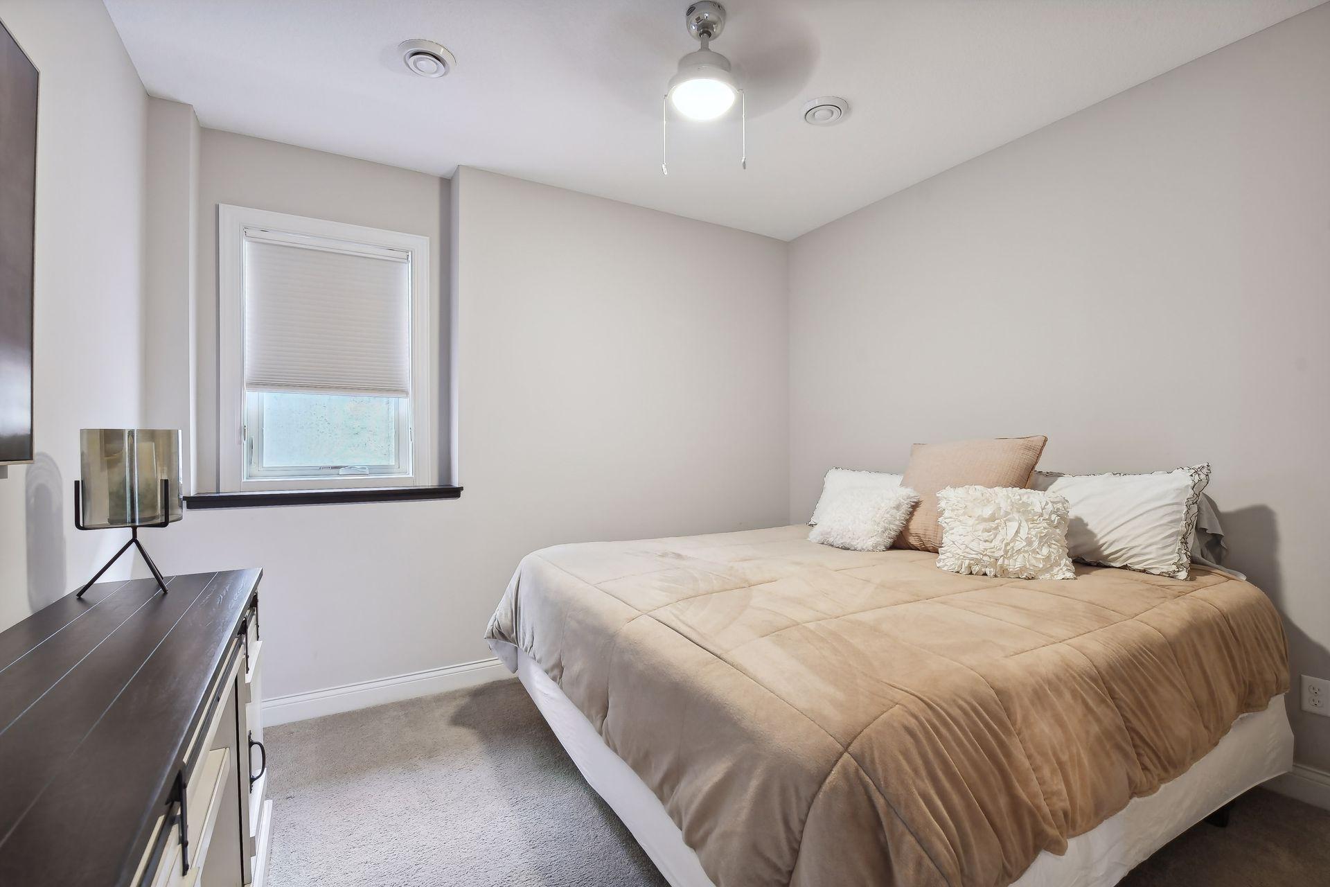 The lower level Guest Bedroom is a great space for your visitors to relax and recharge.