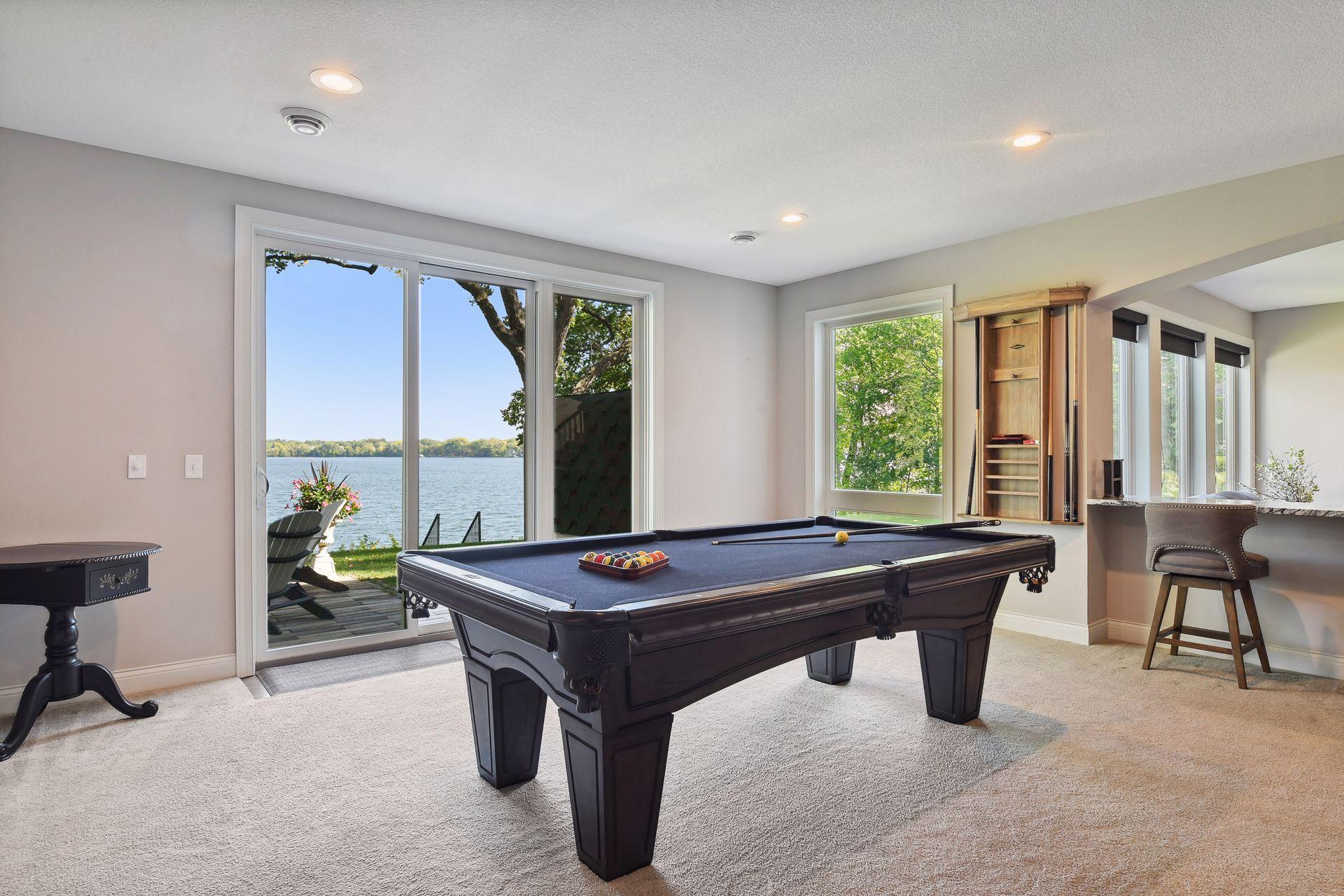The Game Room features an 8-foot sliding door that leads out to the patio.