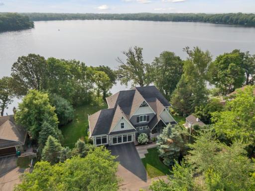 Welcome to 9111 Lake Riley Boulevard. Situated on the tranquil shores of Lake Riley.