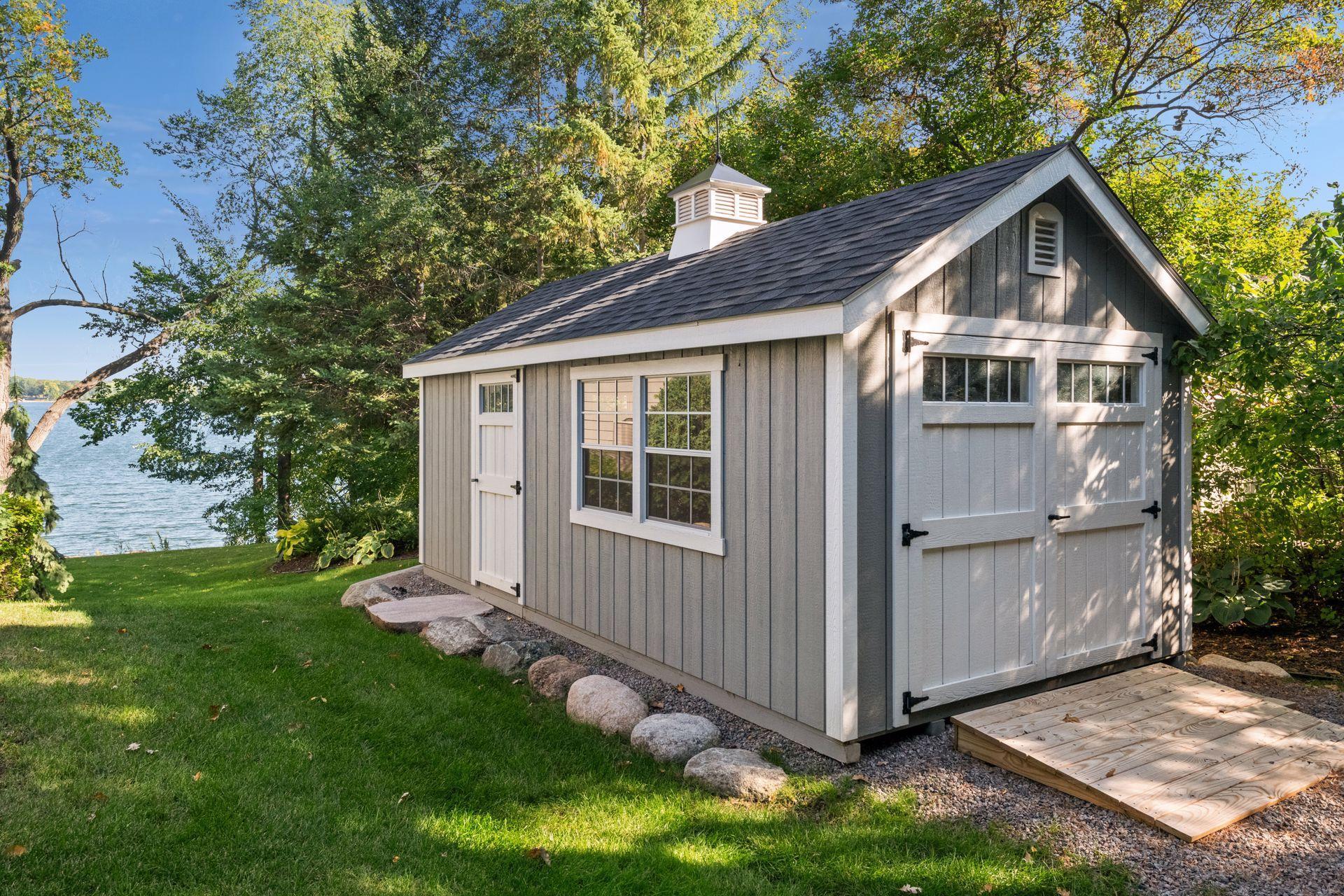 In addition to an oversized and heated 3-car garage, the custom built 10-ft x 20-ft shed provides storage for your lake and yard toys.