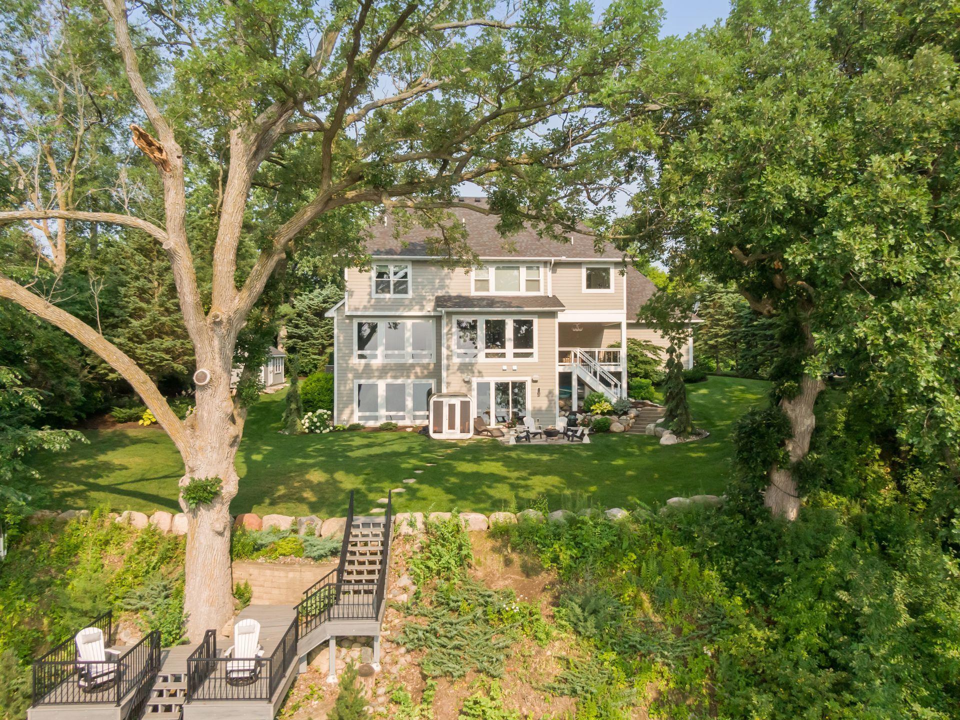 Mature trees create a private and peaceful sanctuary in the backyard.