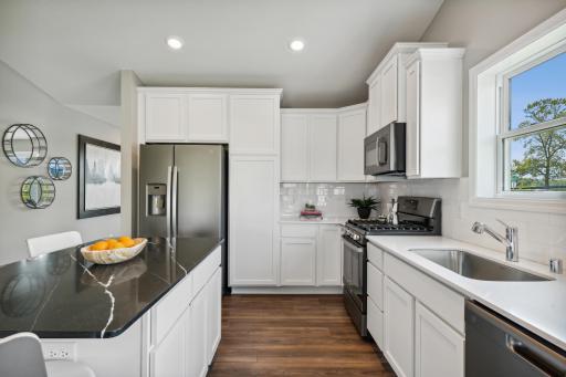 All kitchen appliances come included! *Photos are of a model home; actual features and colors will vary.