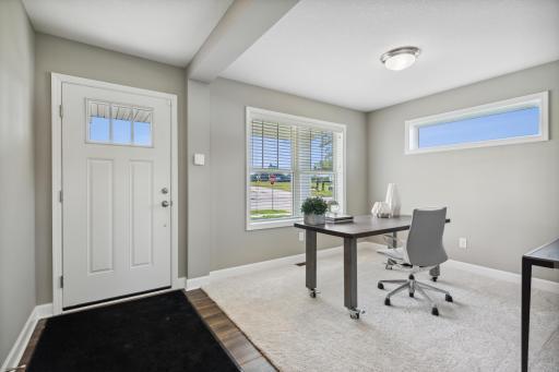 A spacious flex room is located at the foyer offering a nice work at home space, or a formal living room area. *Photos are of a model home; actual features and colors will vary.