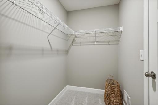 The owner's bedroom also offers a generous walk in shower. *Photos are of a model home; actual features and colors will vary.