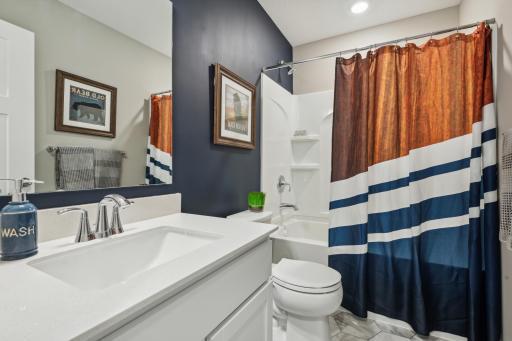 This photo is an example of how a homeowner could finish the basement after closing. This area will not be completed in the actual home; however, other homesites are available to allow a customer to have the basement finished by the builder.