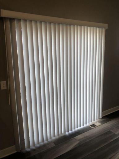 Vertical blinds included at main level sliding glass door