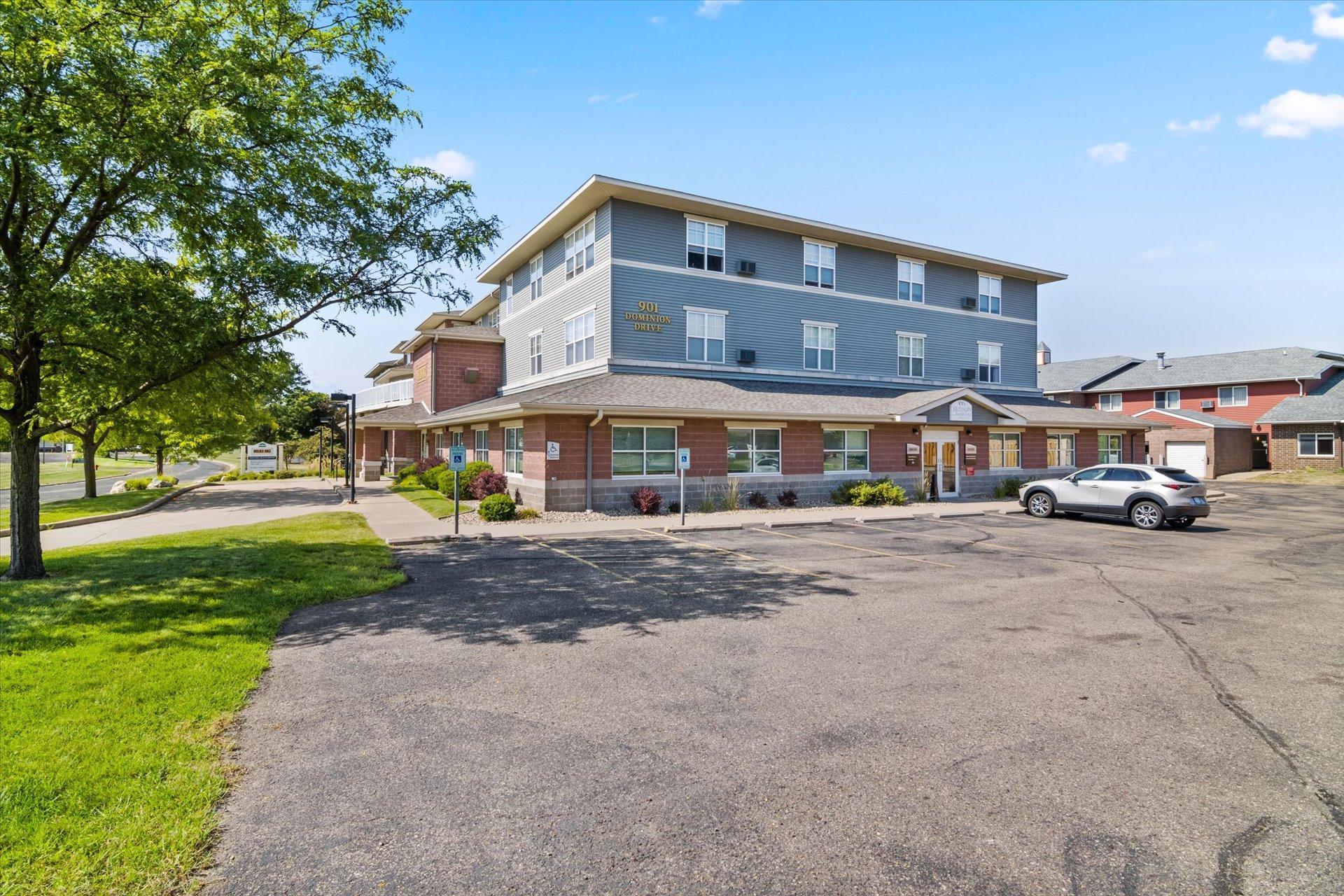 Photo for 901 Dominion Drive, Suite 3, Hudson, WI 54016 - Listing #6432099 Parking lot entrance.jpg
