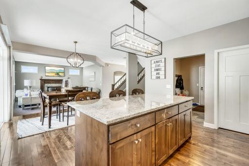 Real wood floor Loads of storage in huge island upgraded light fixtures