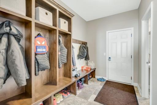 Custom built lockers and beadboard hanging rack perfect for storage