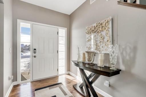Inviting entrance with UPGRADED light fixture Flex room adjacent can be used as Den, office, playroom, formal dining, so many options