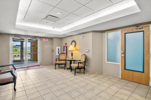 Photo for 901 Dominion Drive, Suite 4, Hudson, WI 54016 - Listing #6432652 Hosford Common Area entrance into office door.jpg