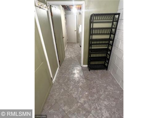 View from the garage service door looking through the mudroom and right into the 2nd bath/laundry